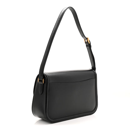 Saint Laurent black leather shoulder bag with gold-tone YSL monogram plaque
