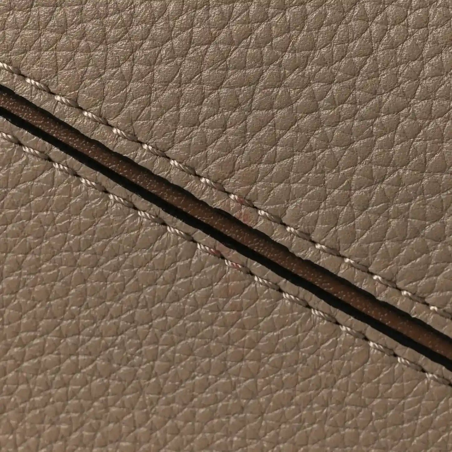Small Puzzle bag grained calfskin texture with dark leather strap detail