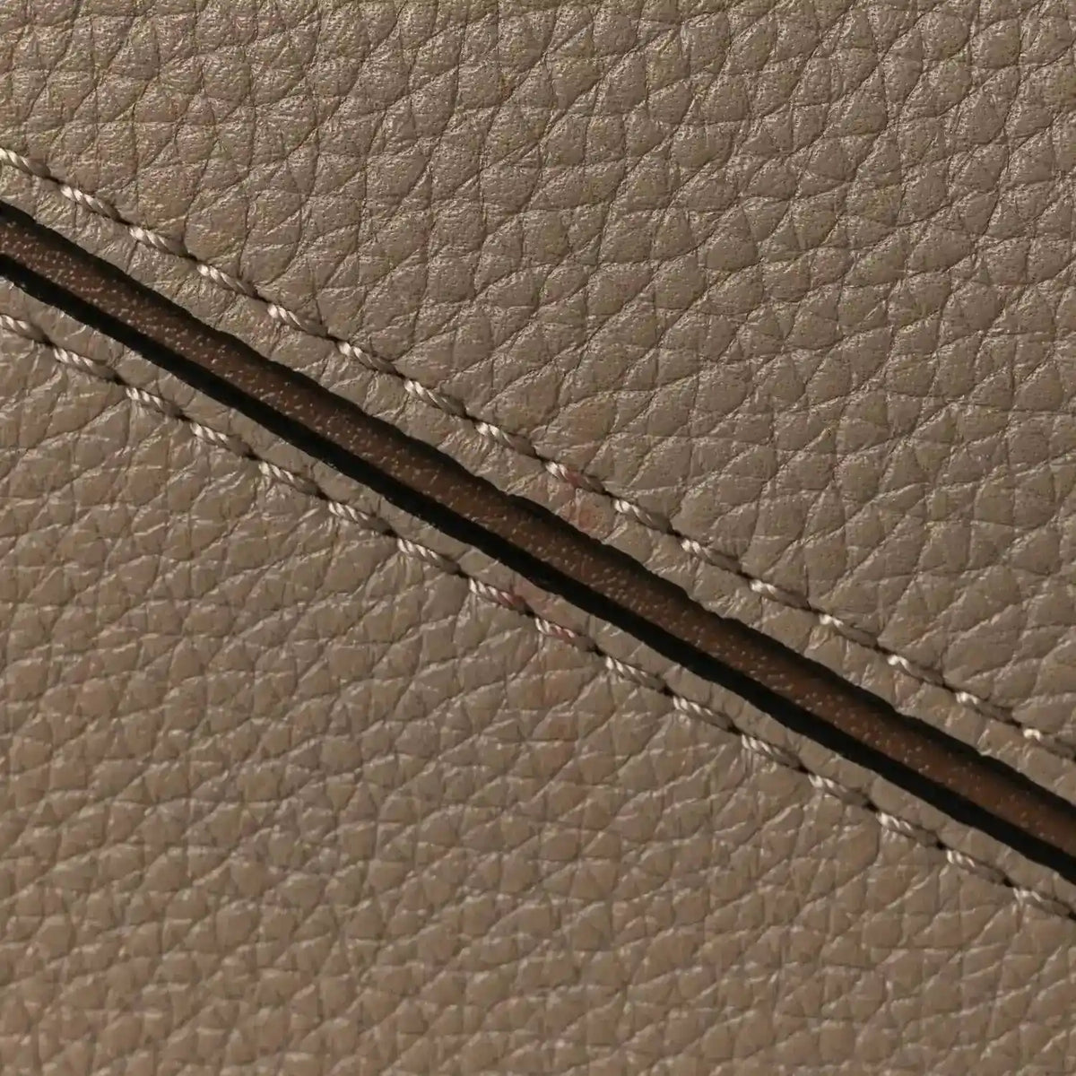 Small Puzzle bag grained calfskin texture with dark leather strap detail