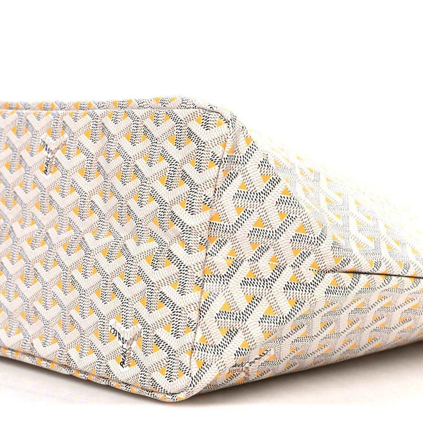 White tote bag with Goyardine-style yellow chevron pattern, fabric surface