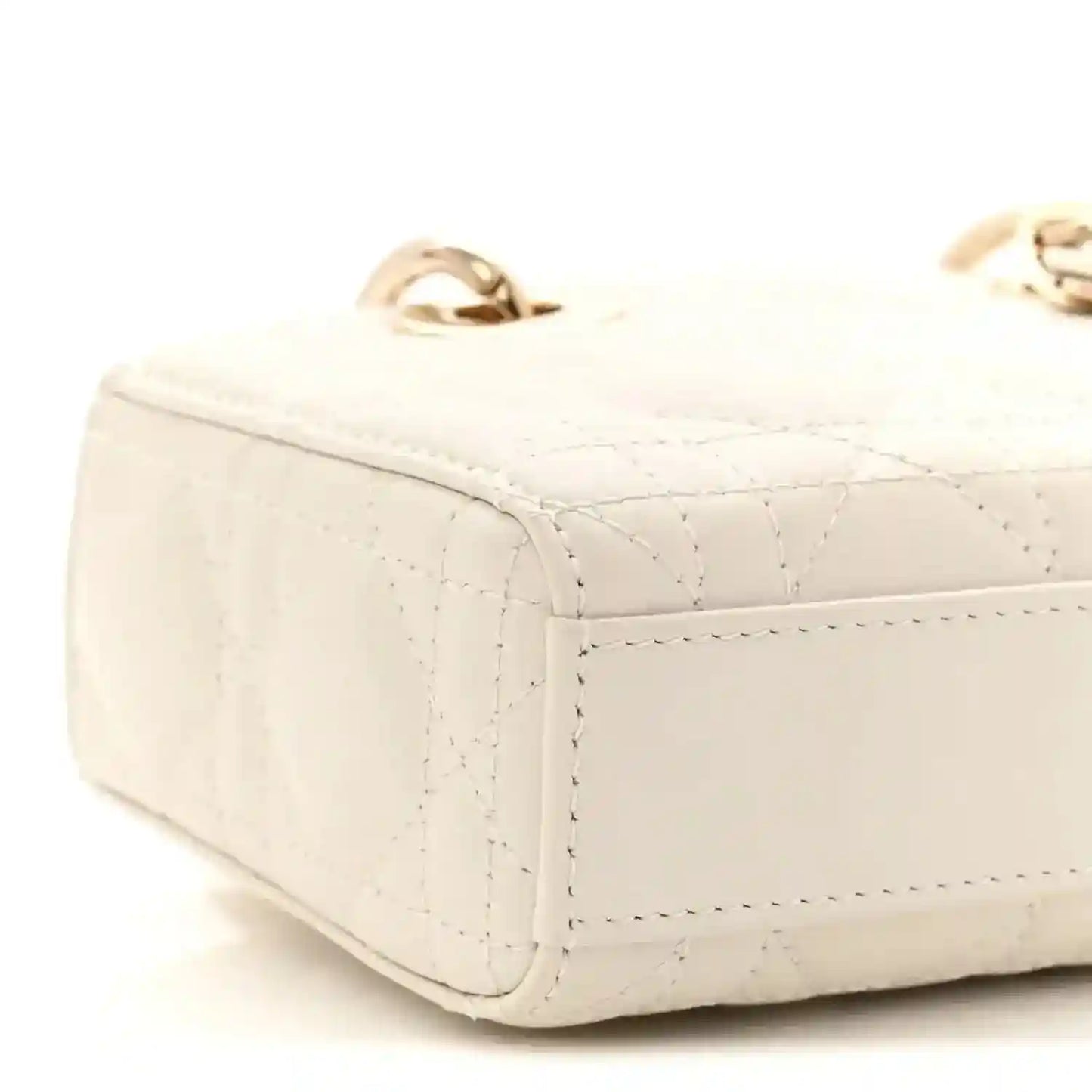 Cream micro lady D-Joy bag side view with quilted cannage texture