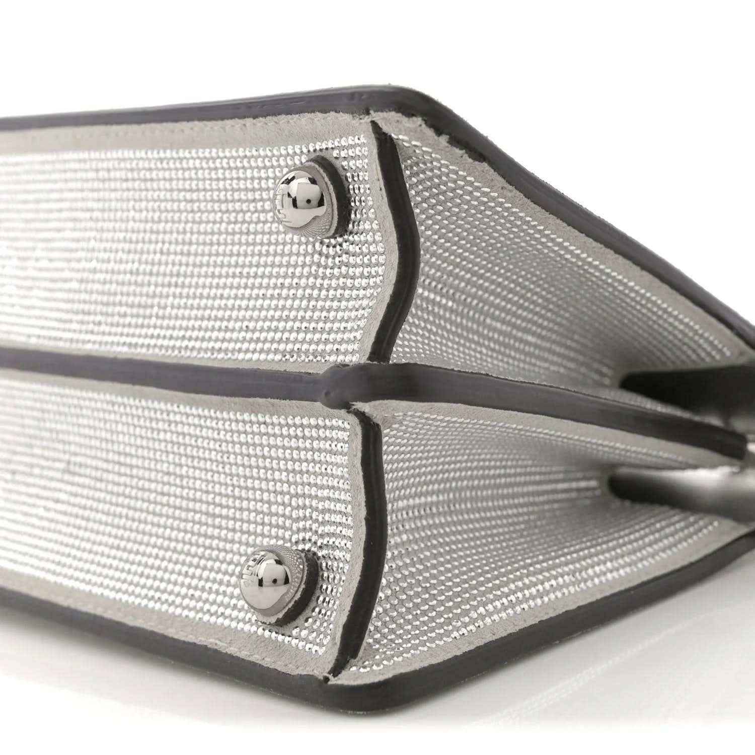 Silver crystal satchel with black edges and two snap tabs