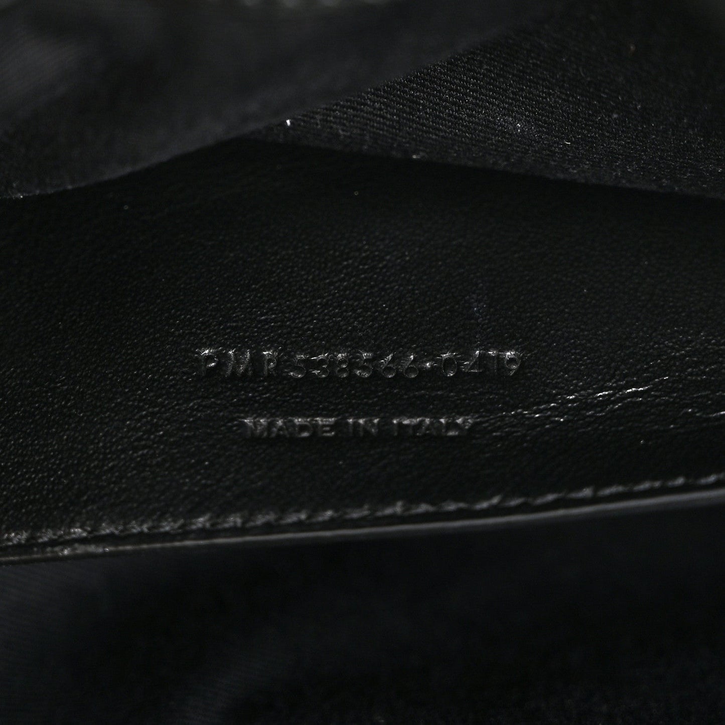 Black satchel interior leather stamp with Made in Italy text