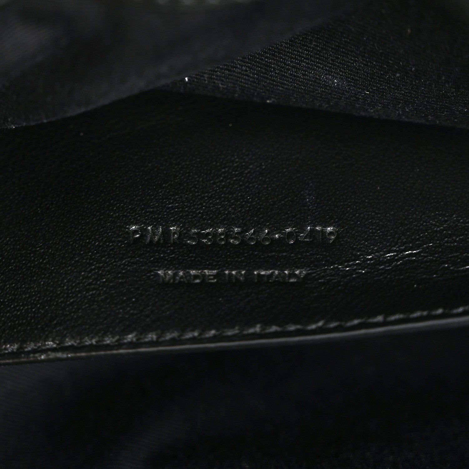 Black satchel interior leather stamp with Made in Italy text