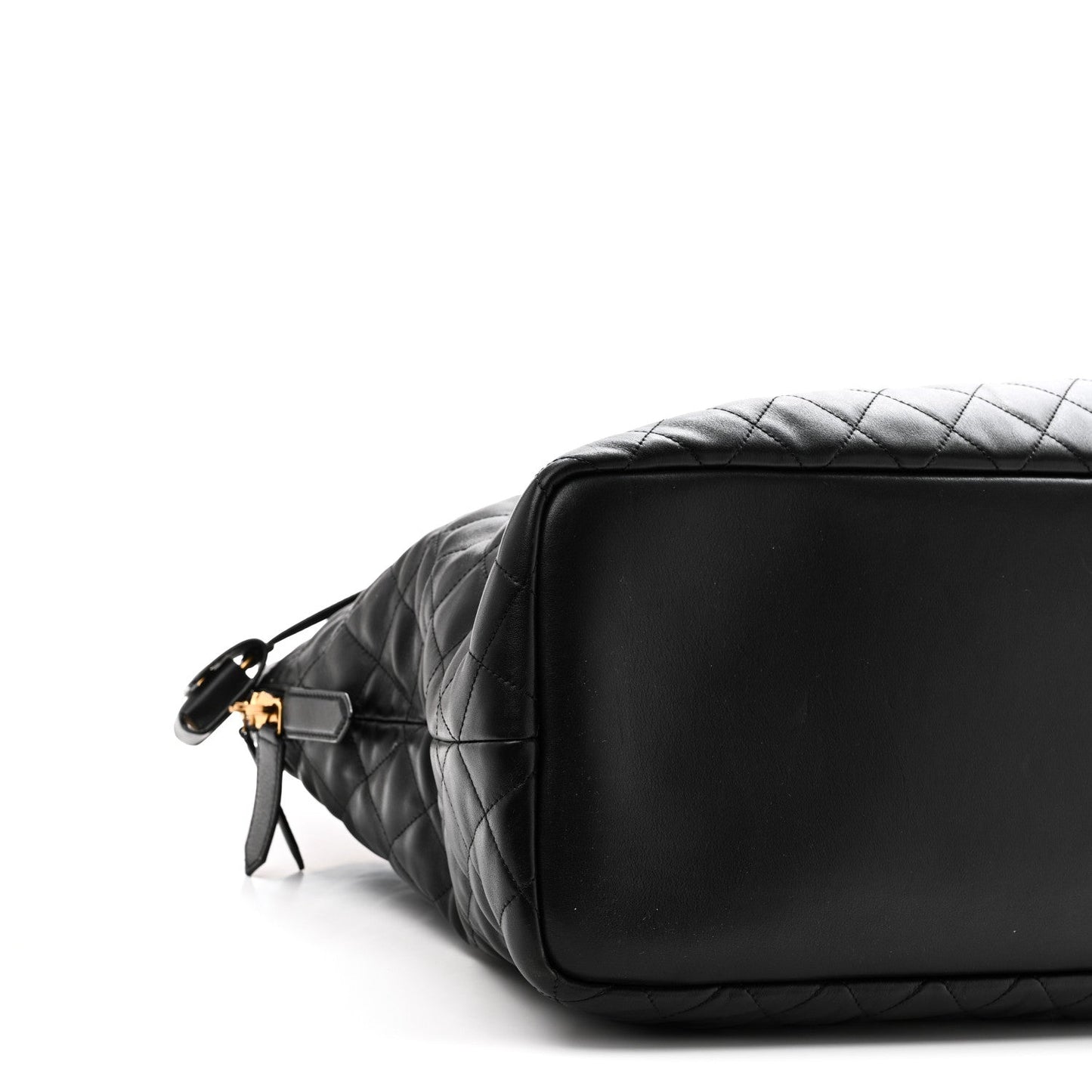 Saint Laurent ES quilted travel bag in black leather, end corner with gold logo hardware.