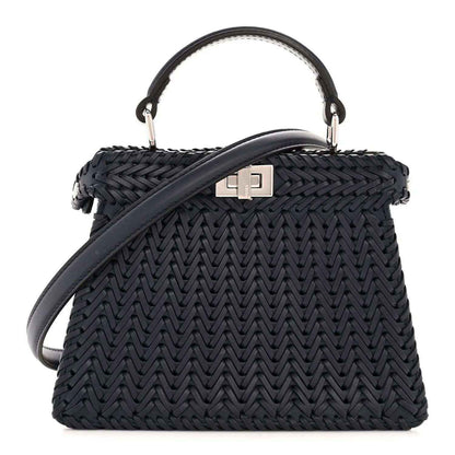 Midnight blue leather petite satchel with woven pattern, top handles and strap