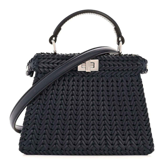 Midnight blue leather petite satchel with woven pattern, top handles and strap