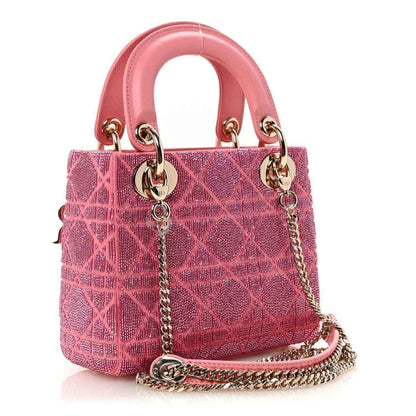 Mini Lady Dior handbag in light pink with gold chain strap and top handles