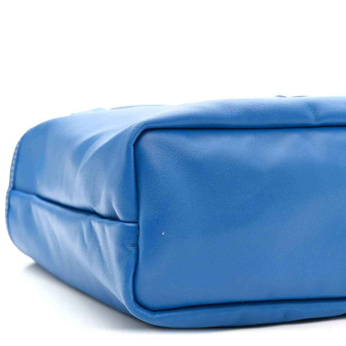 Mini reversible tote bag, smooth blue leather corner with stitched edge and rounded shape