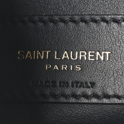 Black leather hobo bag label reading SAINT LAURENT PARIS
