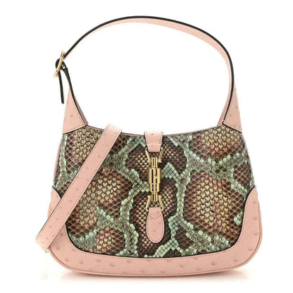 Gucci small Jackie 1961 hobo bag in pink with snakeskin pattern and gold clasp