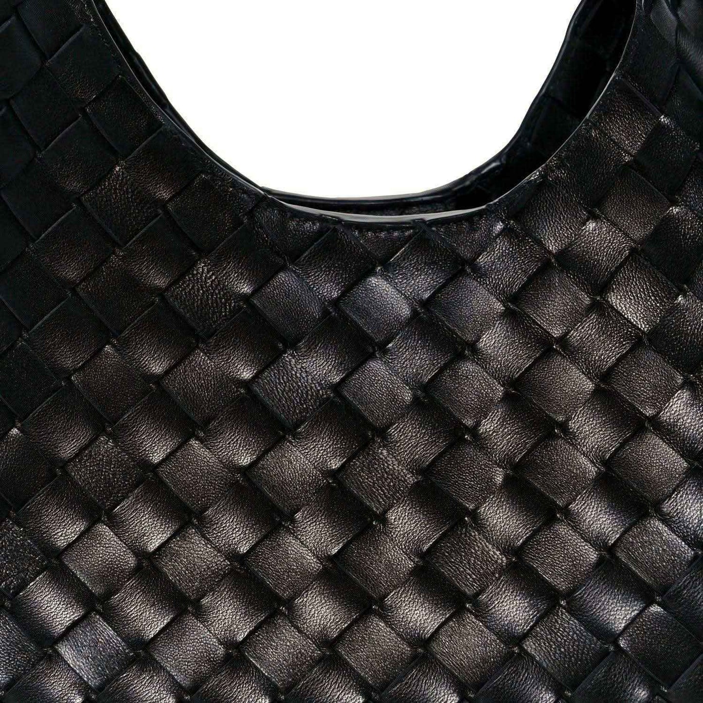 Black intrecciato leather shoulder bag close-up with woven square pattern