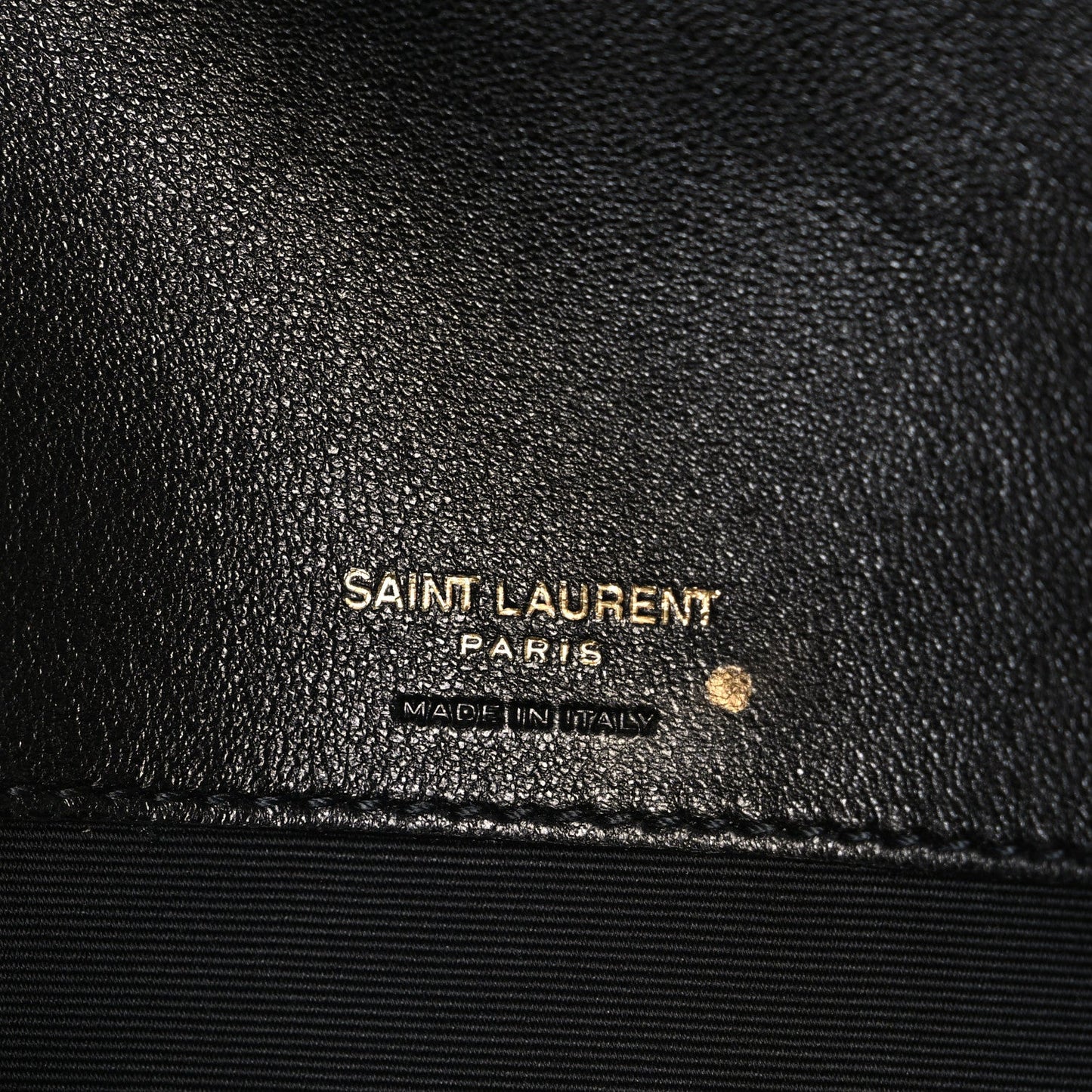 Black leather lining with "SAINT LAURENT PARIS" stamp and "MADE IN ITALY"