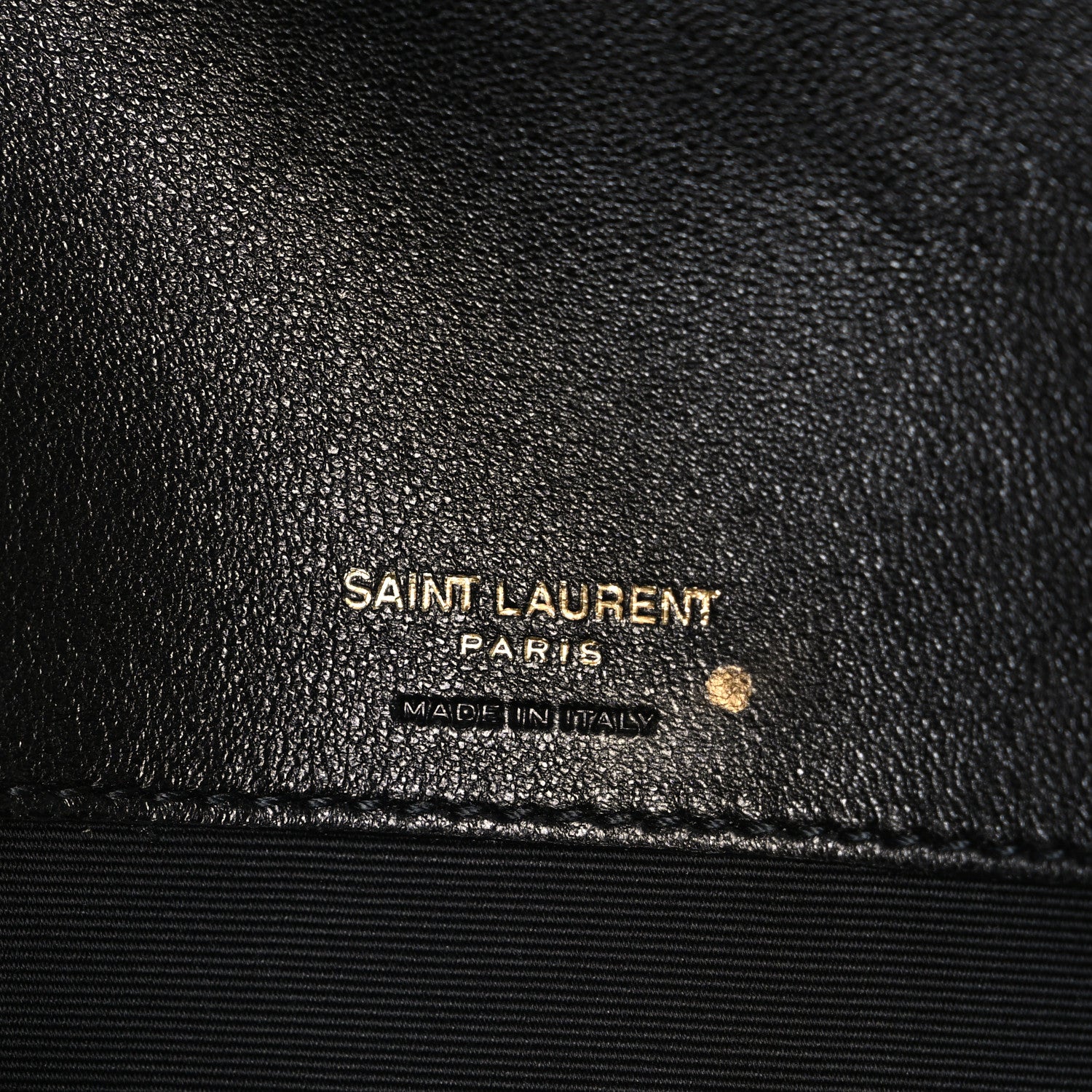 Black leather lining with "SAINT LAURENT PARIS" stamp and "MADE IN ITALY"