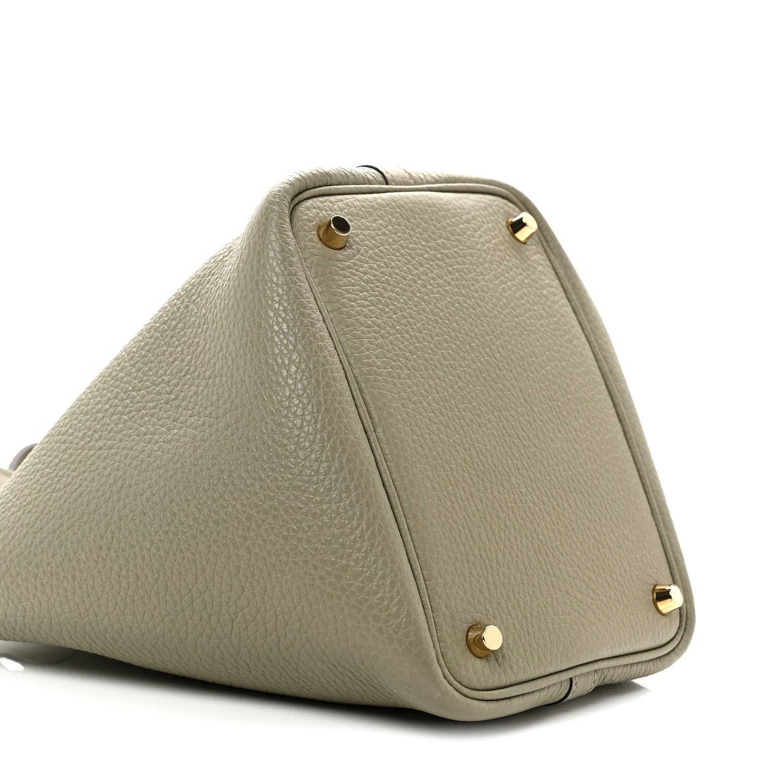 Sauge leather tote bag side view with front flap and gold rivet hardware