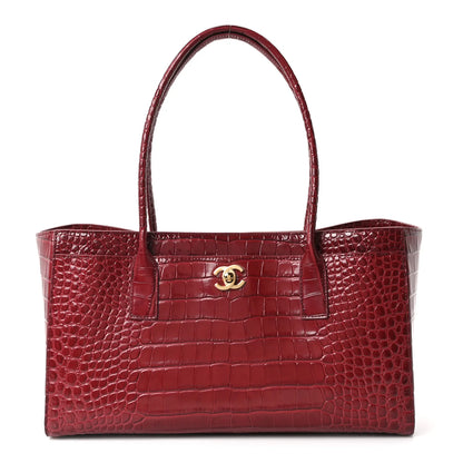 Small shopping tote bag in burgundy croc-embossed calfskin with top handles and logo clasp