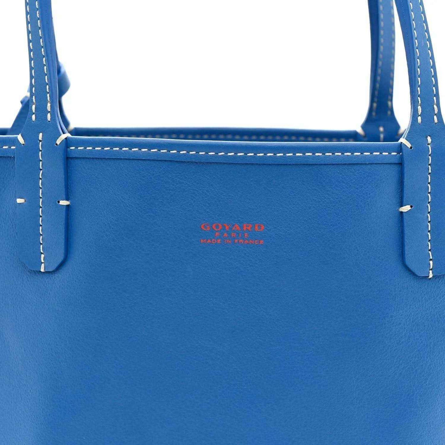 Mini reversible tote bag, solid blue leather front panel with small Goyard logo