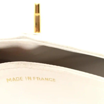 White leather interior with 'MADE IN FRANCE' stamp