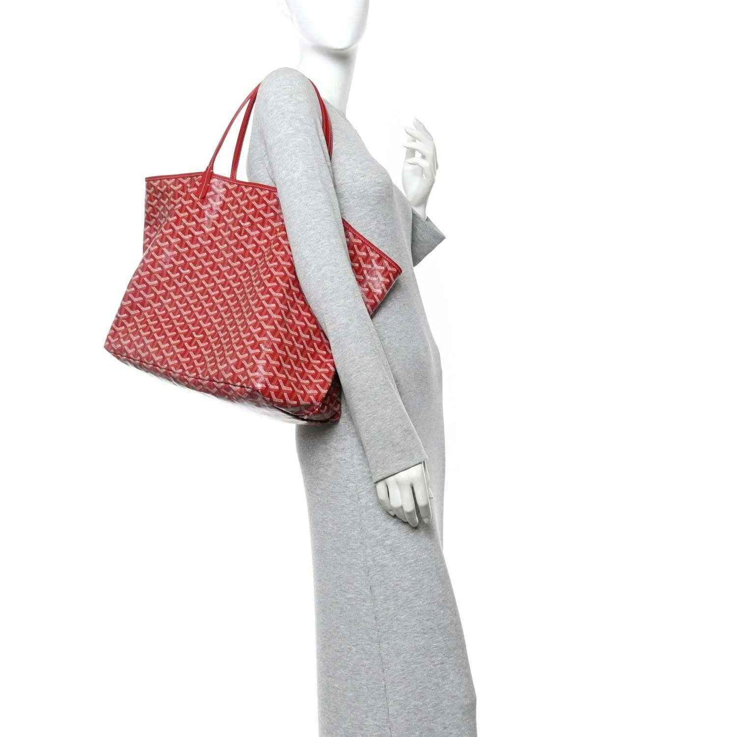 Red Goyardine canvas tote bag with Goyard pattern and short top handles.
