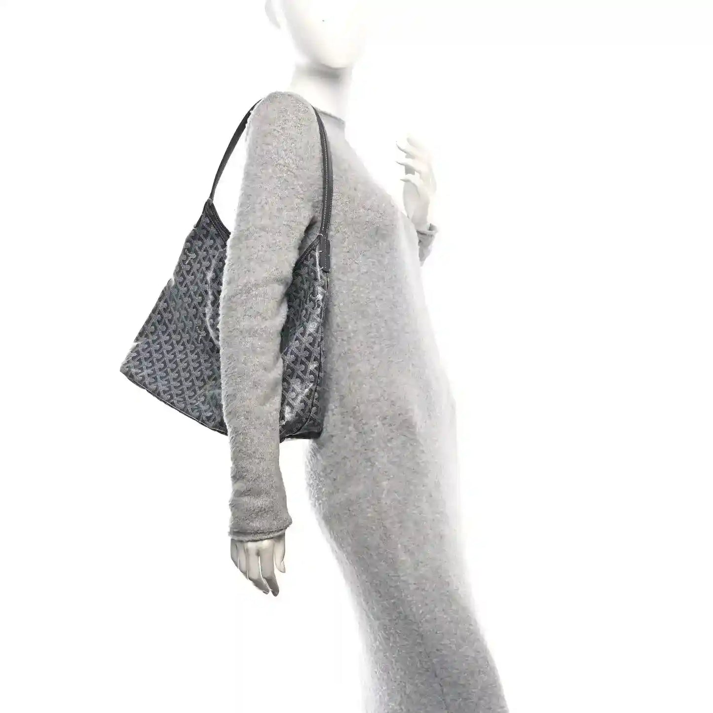 Grey hobo bag with top handle, side profile, and repeating Goyard logo canvas