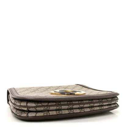GG Supreme monogram medium flap shoulder bag with turn-lock logo, stacked close-up