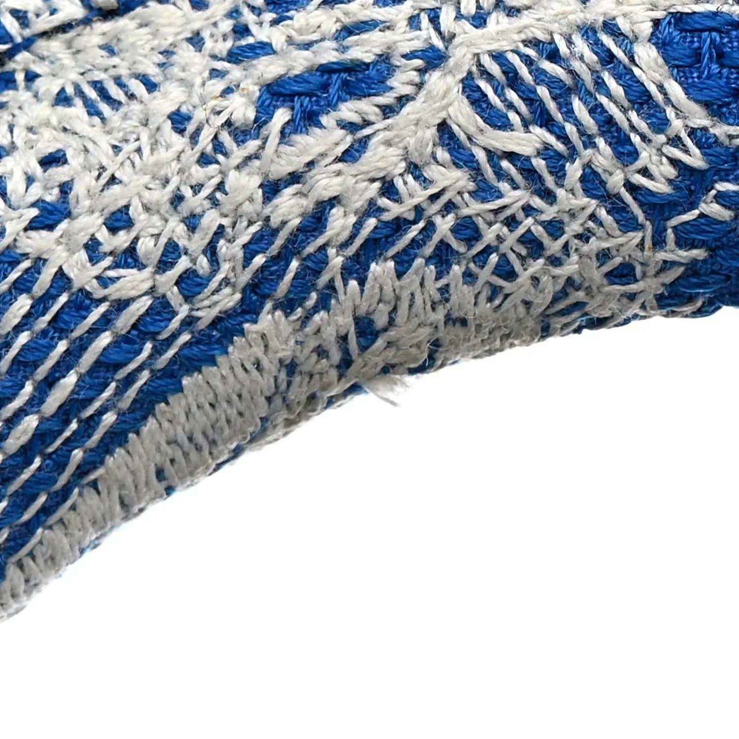 Blue-and-white toile bag with braided trim, close-up corner