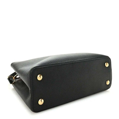 Black leather handbag base with gold stud feet and textured grain