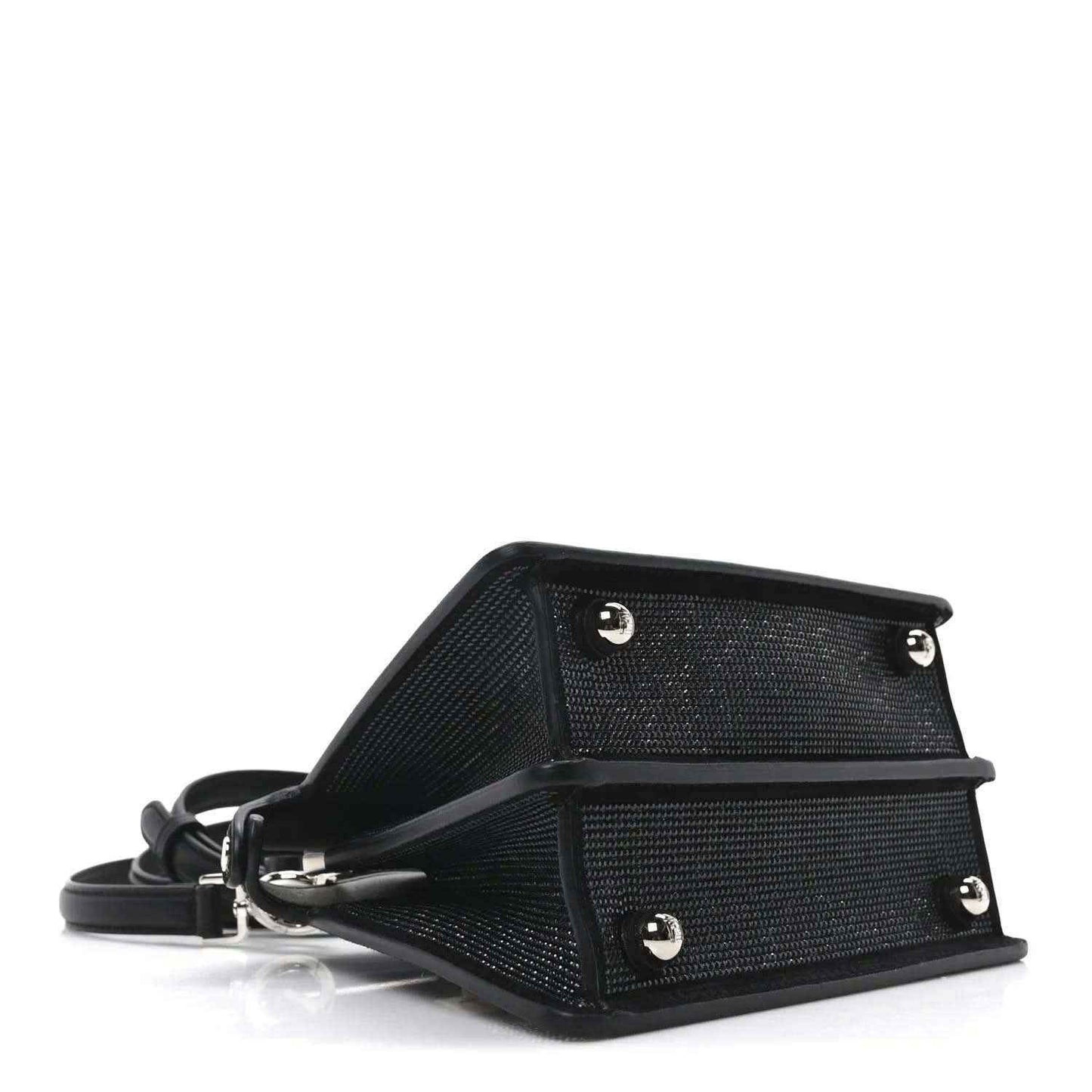 Black leather-trimmed satchel base with hardware studs and adjustable strap