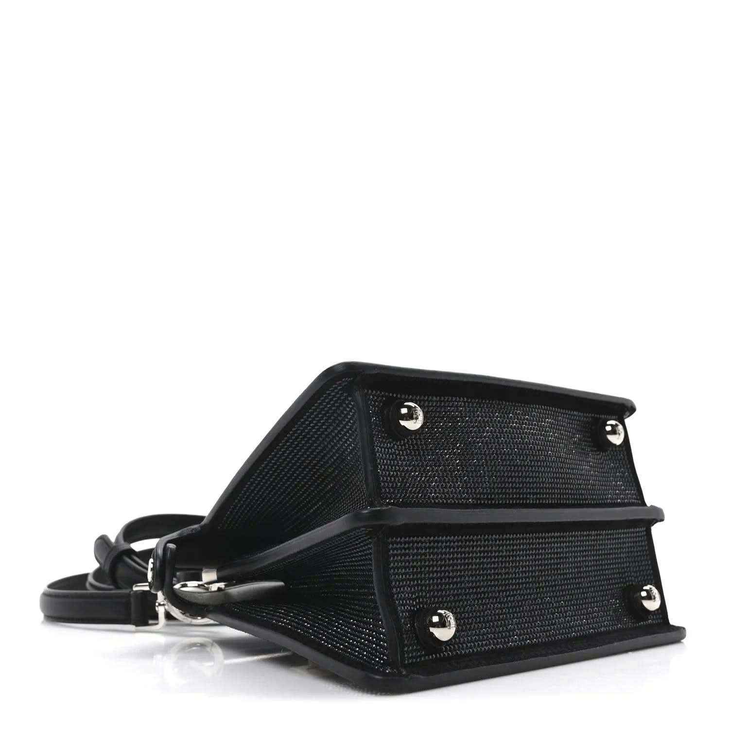 Black leather-trimmed satchel base with hardware studs and adjustable strap
