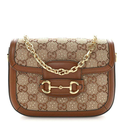 Mini shoulder bag with GG monogram canvas, brown leather trim, and gold chain strap