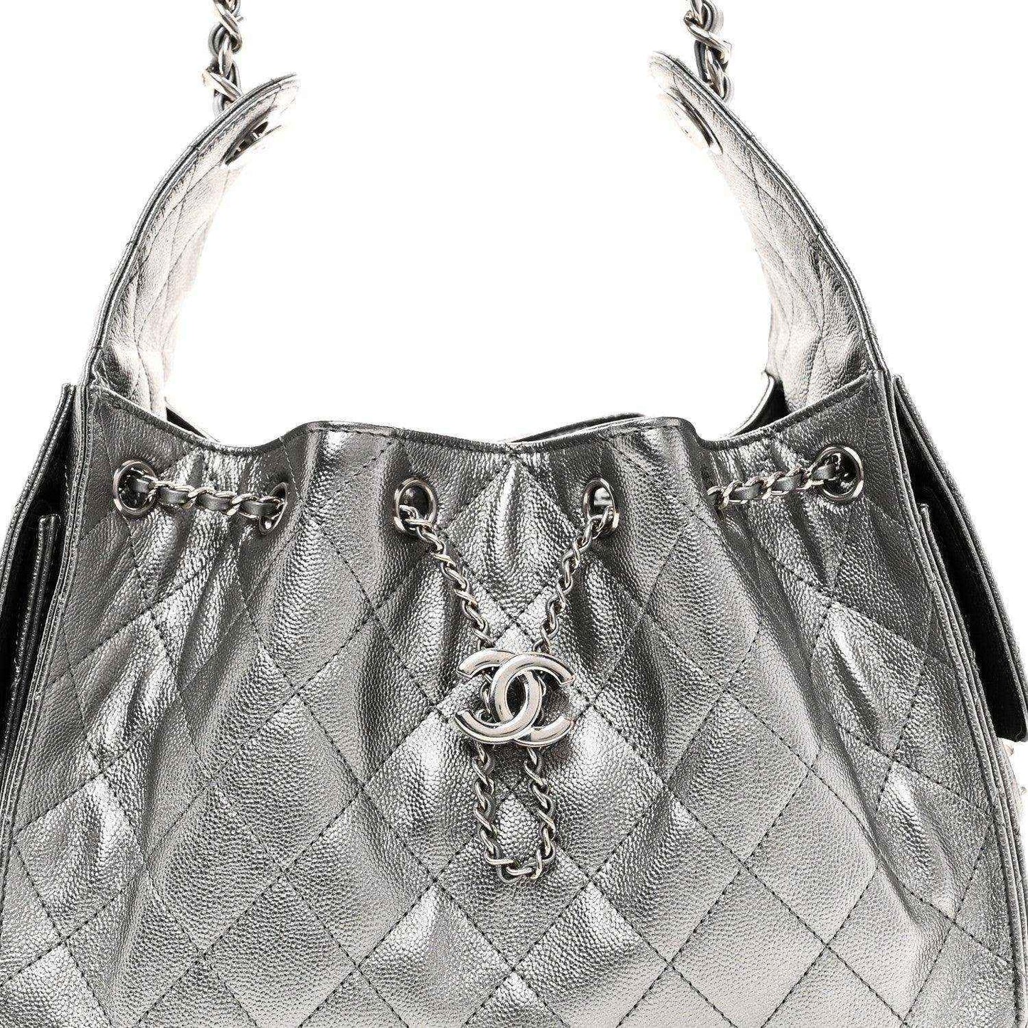Chanel metallic caviar quilted handbag top with chain strap and CC logo ring detail