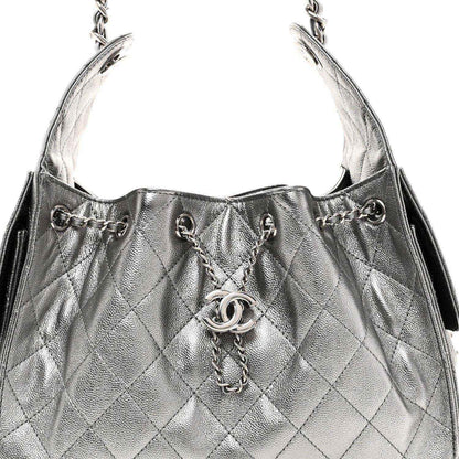 Chanel metallic caviar quilted handbag top with chain strap and CC logo ring detail