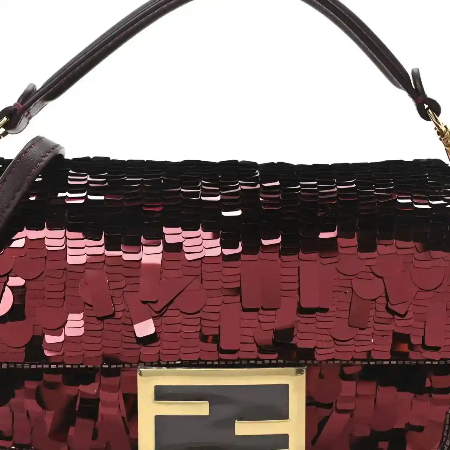 Mini baguette handbag close-up of red sequin front and gold-toned clasp plate