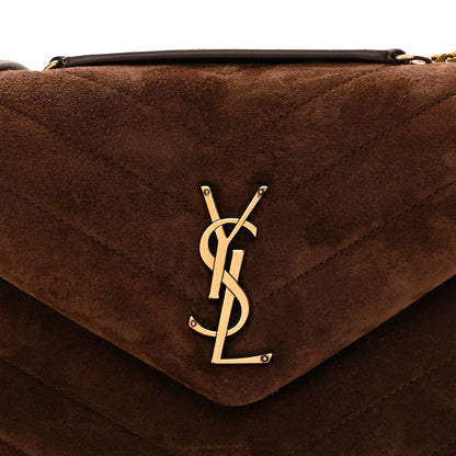 Quilted suede satchel flap with YSL monogram accent and gold clasp, brown