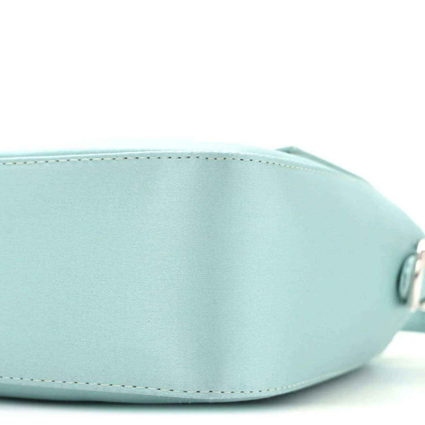 Light blue satin nappa baguette bag, rounded end detail and stitching