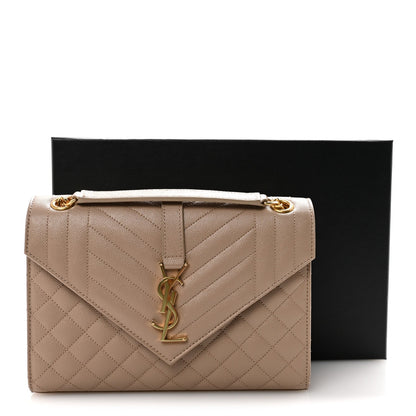 Dark beige medium quilted satchel with gold-tone chain strap and YSL monogram clasp; gift box shown.