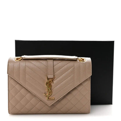 Dark beige medium quilted satchel with gold-tone chain strap and YSL monogram clasp; gift box shown.