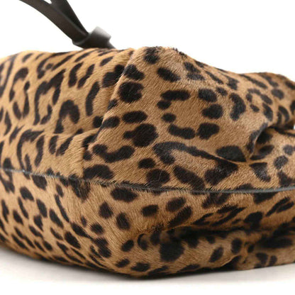Leopard print mini spy bag with brown fur texture and top handle