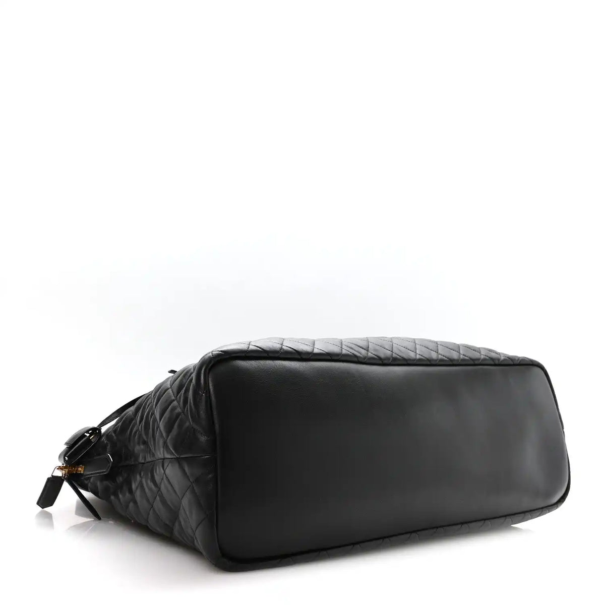 Black quilted leather travel bag with top zip and smooth end panel