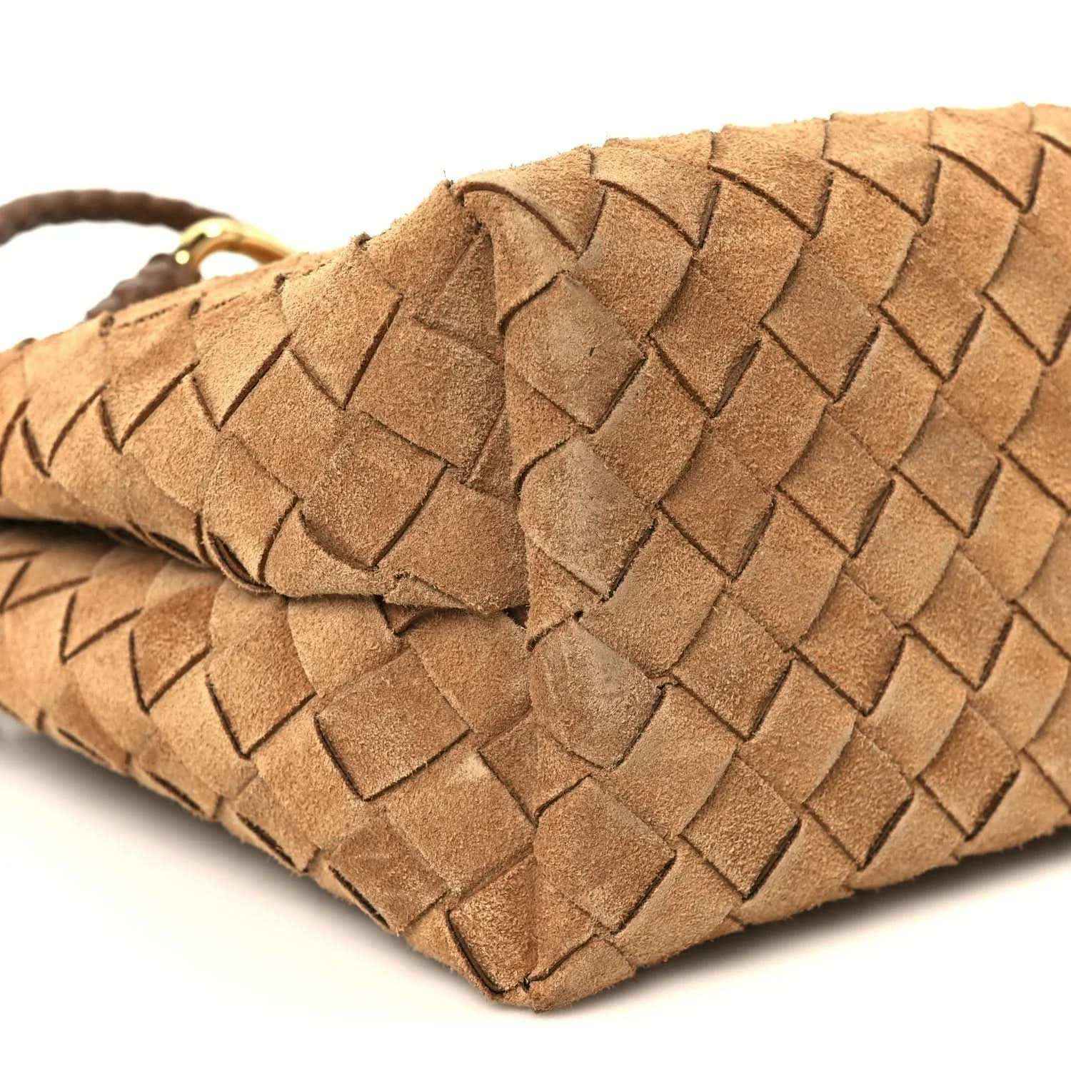 Amber suede intrecciato bottom corner with braided loop and woven texture