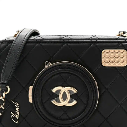 Black quilted lambskin crossbody bag front with round CC logo medallion