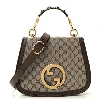 Medium GG Supreme monogram shoulder bag with front clasp and gold-tone hardware