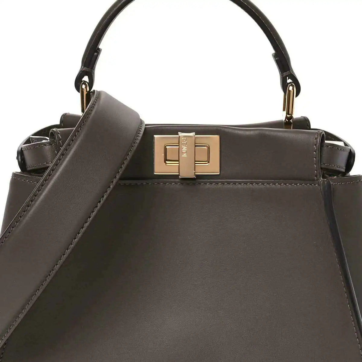 Mini Peekaboo satchel front view in dark brown leather with gold clasp.