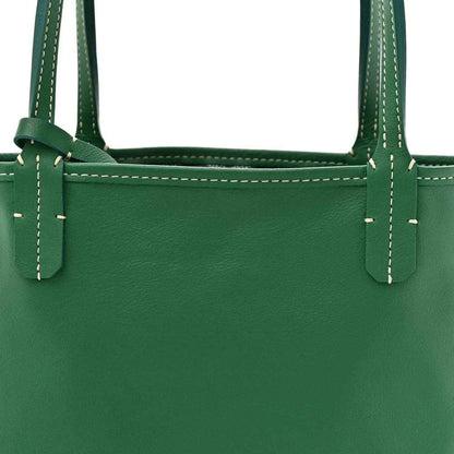 Reversible tote bag front panel in green with top handles and contrast stitching