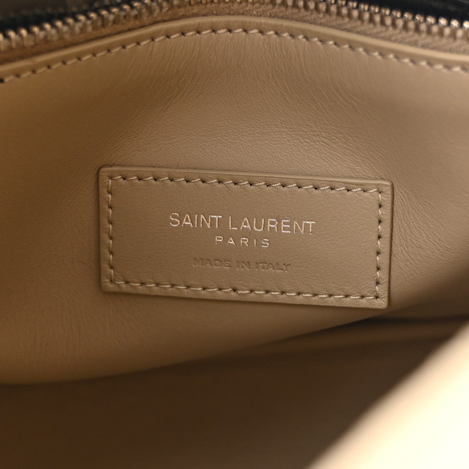 SAINT LAURENT PARIS leather label, stitched on beige lining