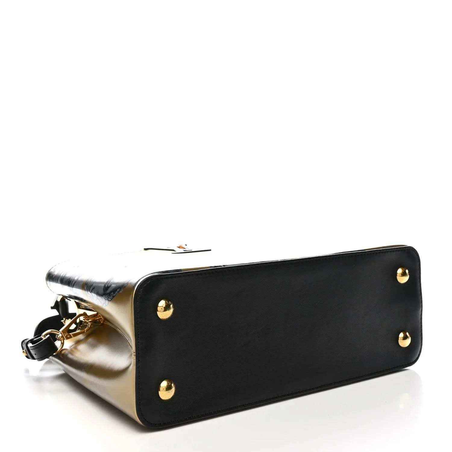 Leather handbag front with gold studs, black body edge trim, and gold side panel