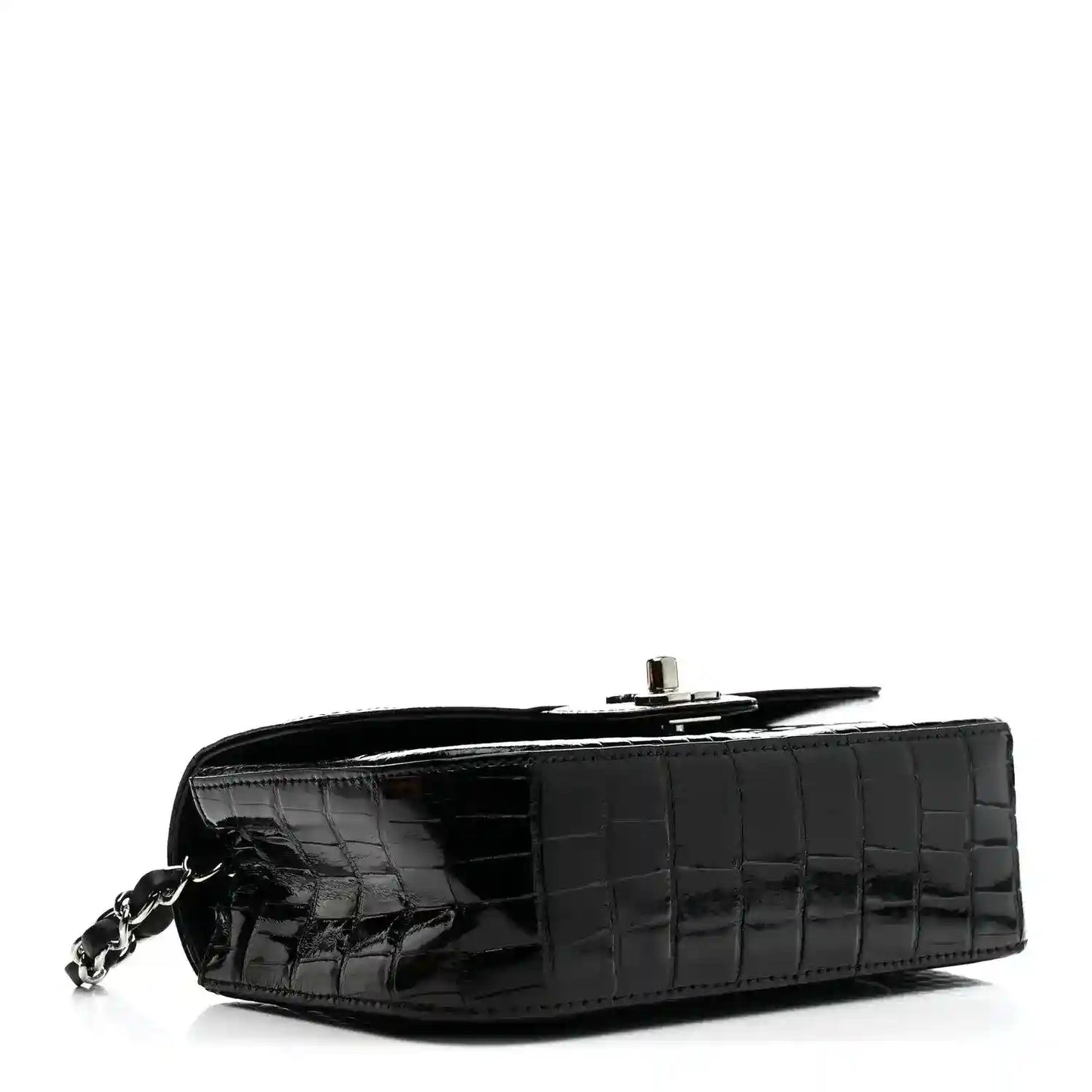 Black mini rectangular flap bag with glossy alligator texture and chain strap clasp.