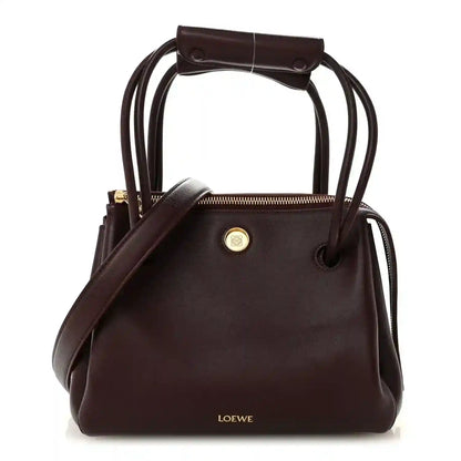 Loewe Small Madrid bag in dark burgundy calfskin, top handle and drawstring closure