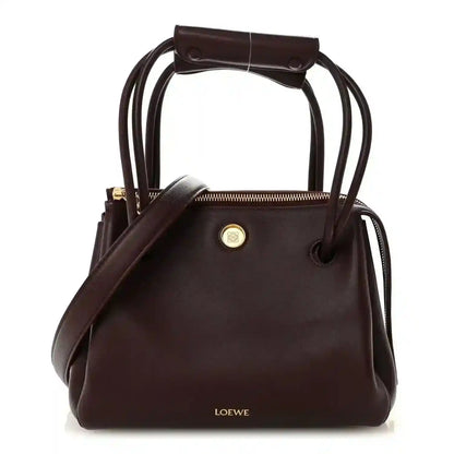 Loewe Small Madrid bag in dark burgundy calfskin, top handle and drawstring closure