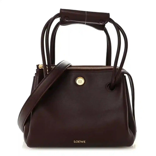 Loewe Small Madrid bag in dark burgundy calfskin, top handle and drawstring closure
